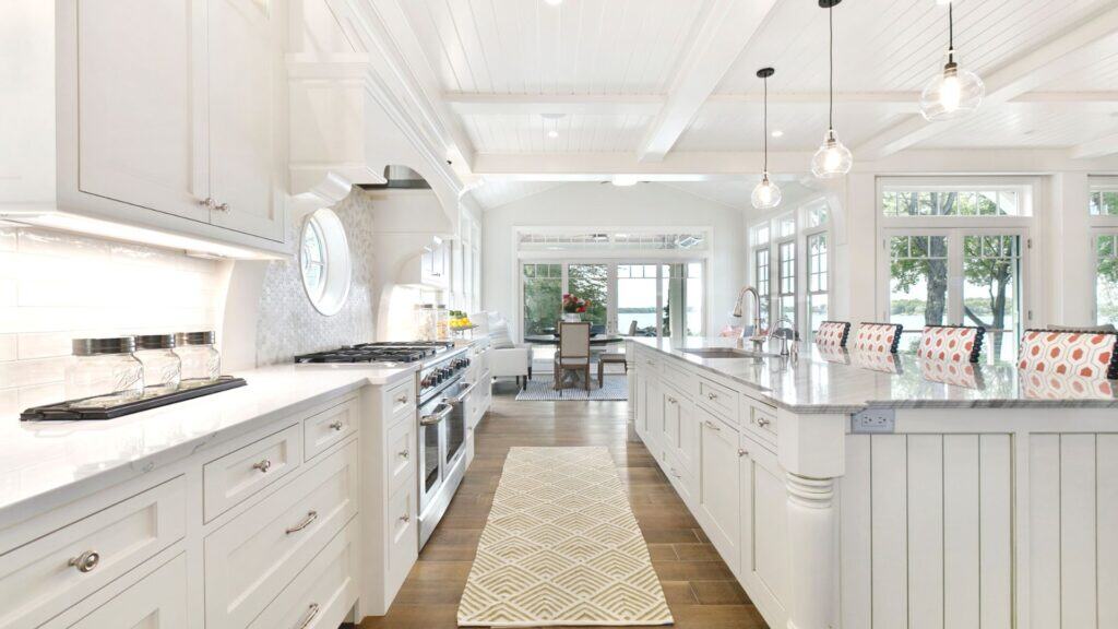 kitchen with curved kitchen tops, round window, curved light fittings and more